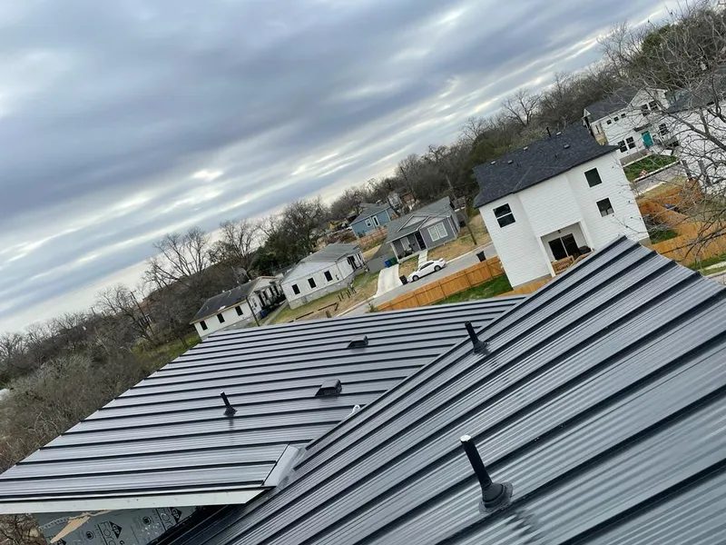 Standing seam metal roof panels with vents for Skylight Repair in Hugo